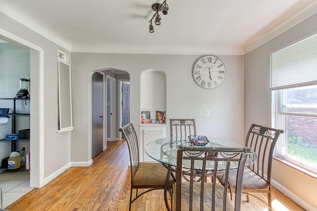 dining area featuring wood-type flooring