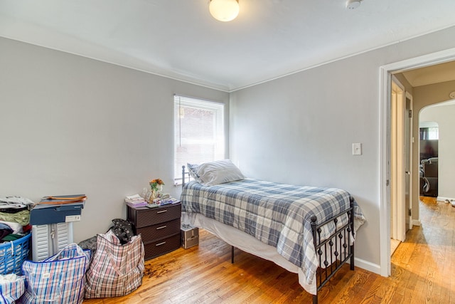 bedroom with light hardwood / wood-style flooring