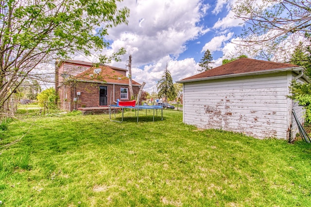 view of yard featuring a trampoline