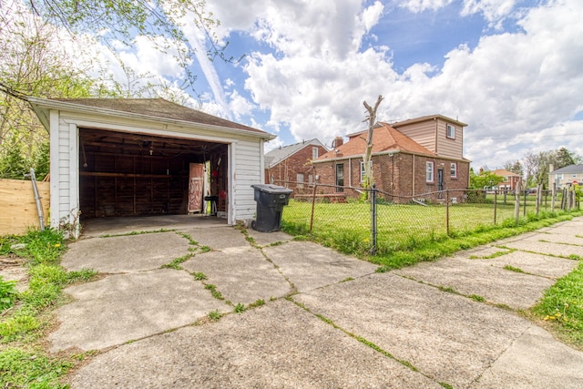 garage featuring a yard