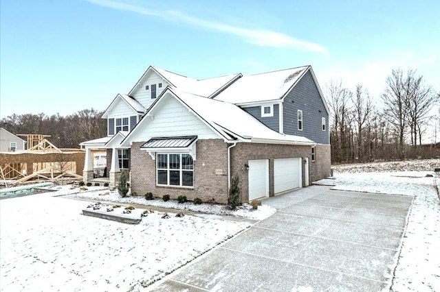 view of front of home featuring a garage