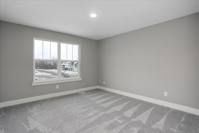 view of carpeted spare room