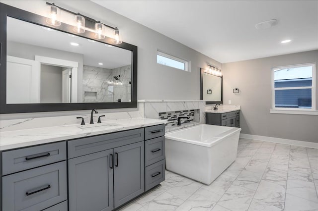 bathroom featuring plus walk in shower and vanity