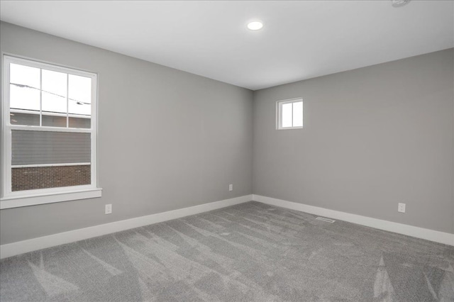 empty room featuring carpet flooring