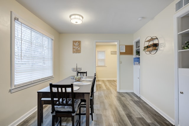 dining room featuring hardwood / wood-style floors