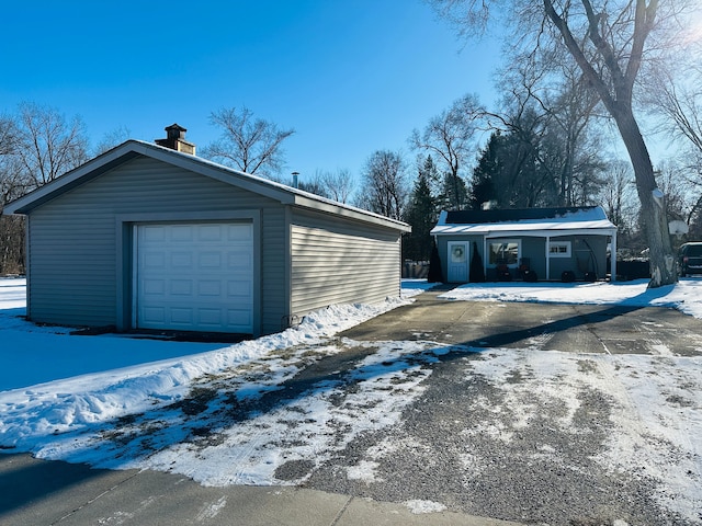 view of snow covered garage