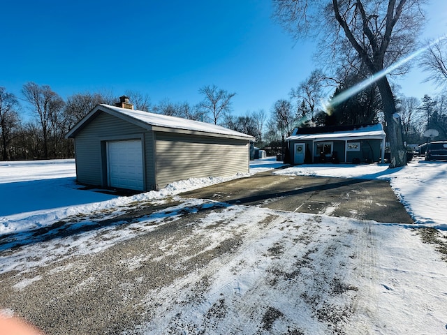 view of snow covered garage