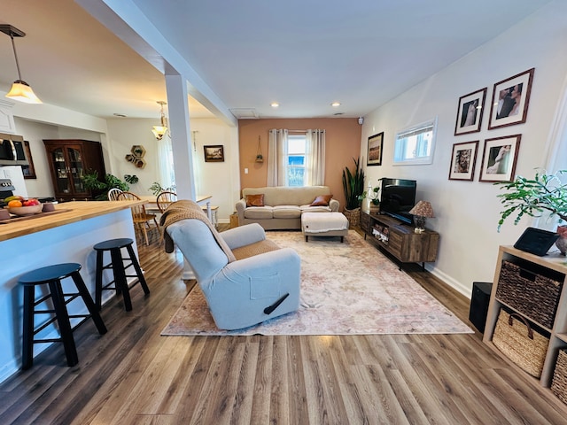 living room featuring dark hardwood / wood-style floors