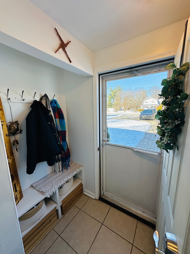 mudroom with light tile patterned floors