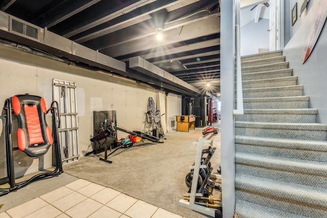 exercise area featuring carpet flooring