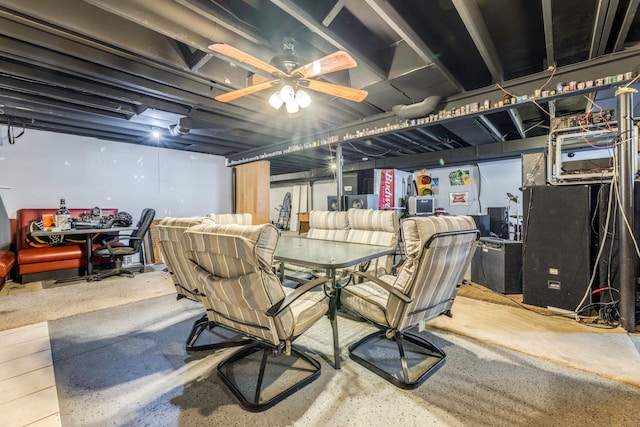 basement with ceiling fan