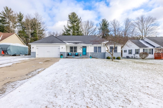 single story home with a garage