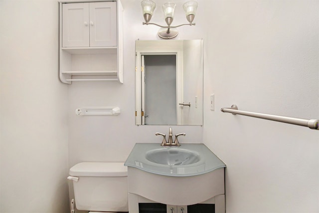 bathroom featuring toilet and sink