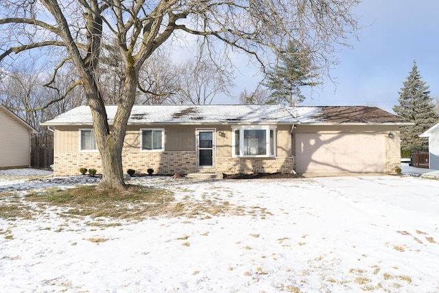 ranch-style house with a garage and cooling unit