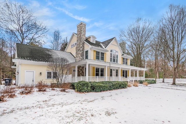 view of front of property featuring covered porch