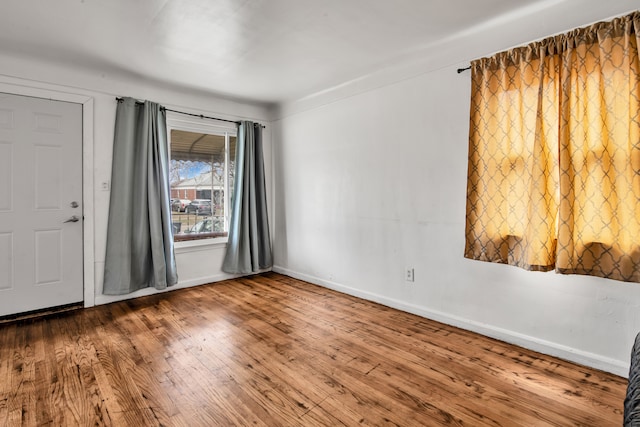 foyer entrance featuring hardwood / wood-style floors