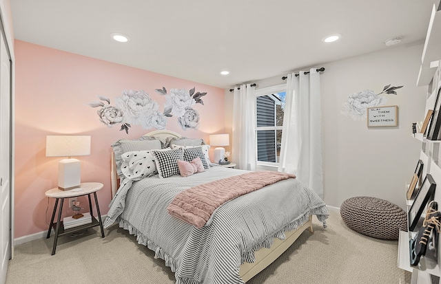 bedroom featuring light carpet, baseboards, and recessed lighting