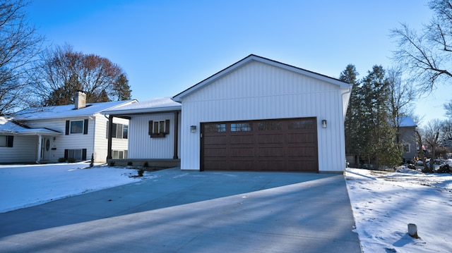 modern inspired farmhouse featuring a garage