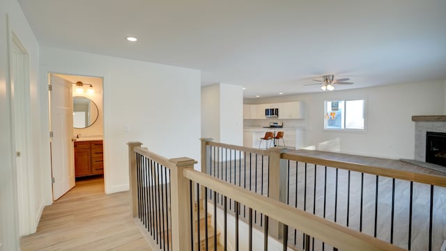 corridor featuring light hardwood / wood-style flooring