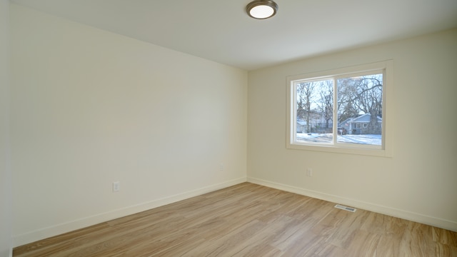 empty room featuring light hardwood / wood-style floors