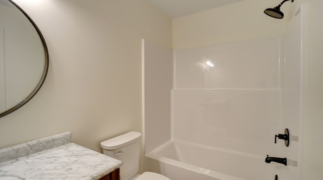 full bathroom featuring shower / bathing tub combination, vanity, and toilet