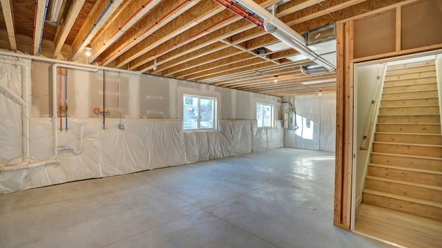 basement featuring electric panel