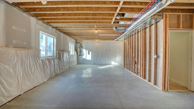 basement featuring electric panel