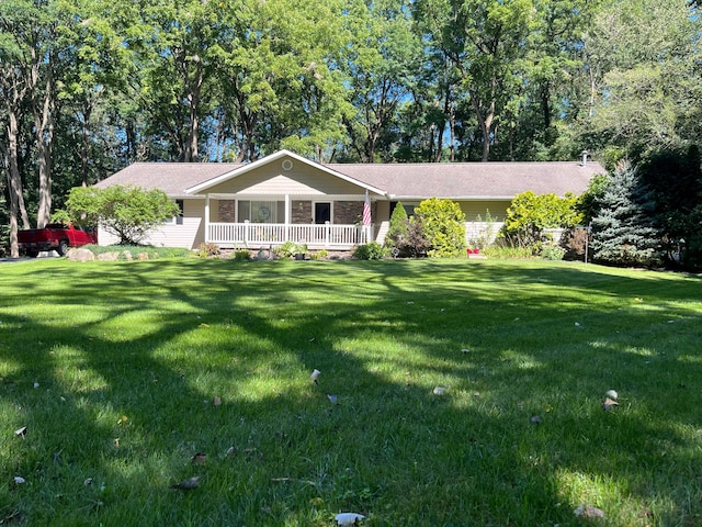 ranch-style house featuring a front yard and a porch