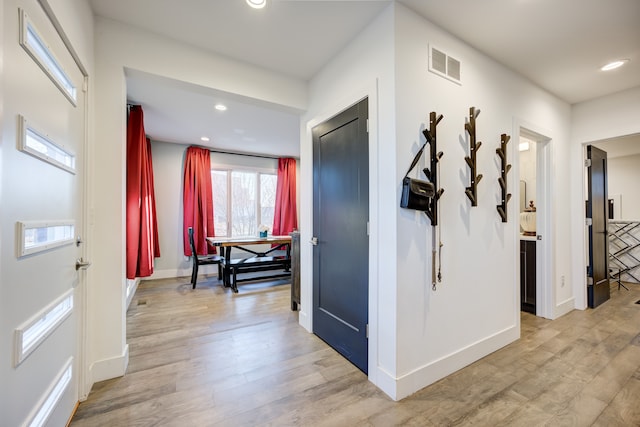 hall featuring light wood-type flooring