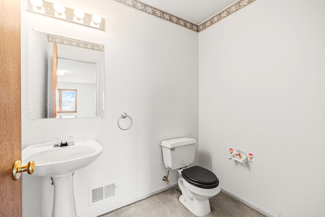 bathroom featuring toilet