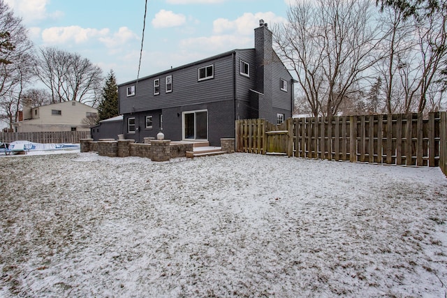 view of snow covered property