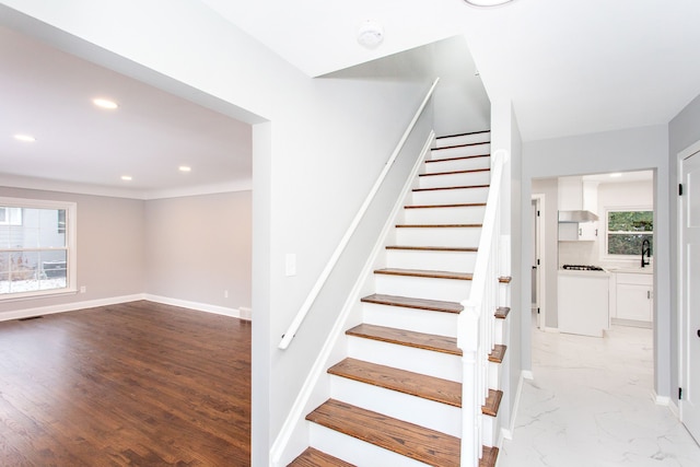 staircase with sink