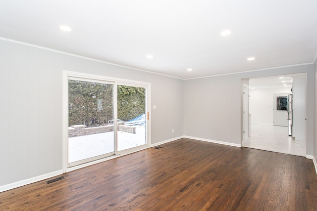 interior space with crown molding and wood-type flooring