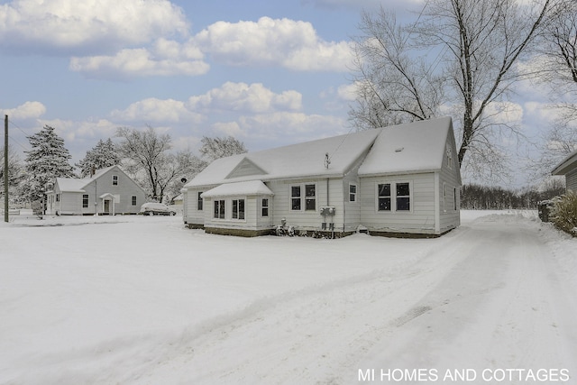 view of snow covered house