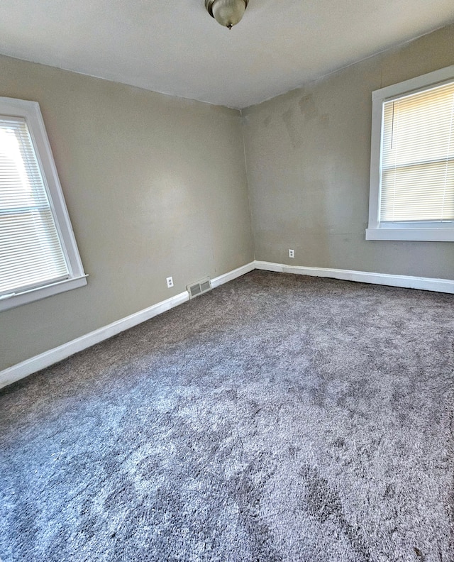 view of carpeted spare room