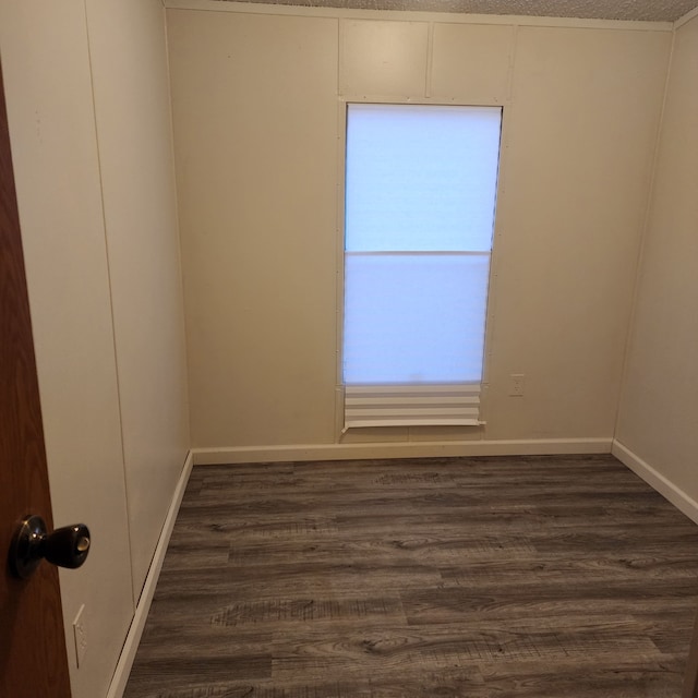 empty room featuring dark hardwood / wood-style floors