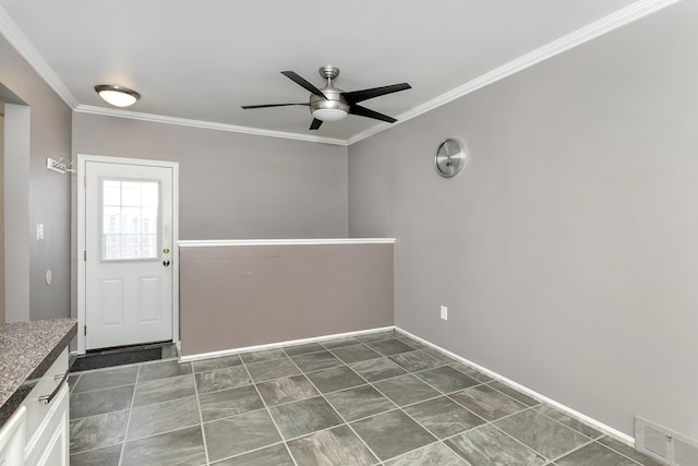 interior space featuring crown molding and ceiling fan