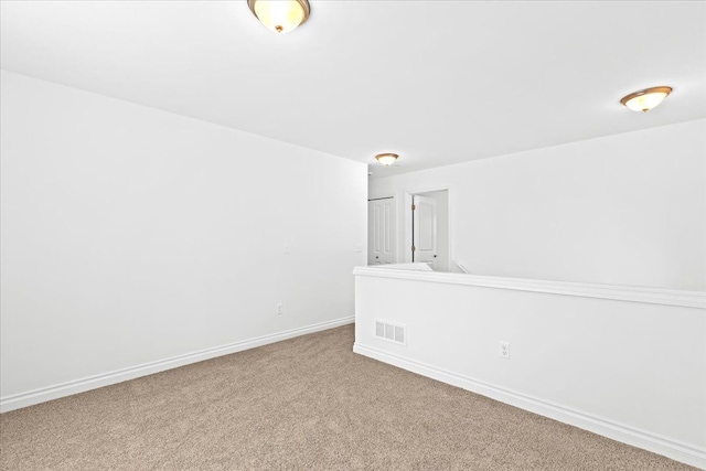 empty room with carpet floors