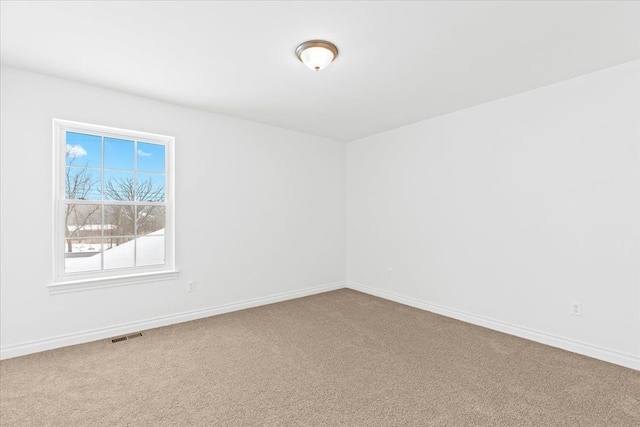 view of carpeted spare room