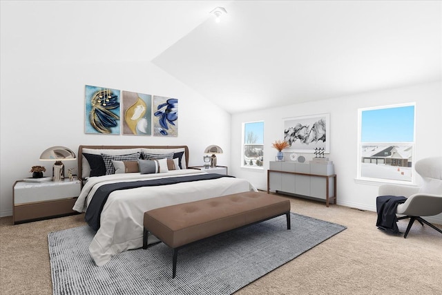 carpeted bedroom featuring lofted ceiling