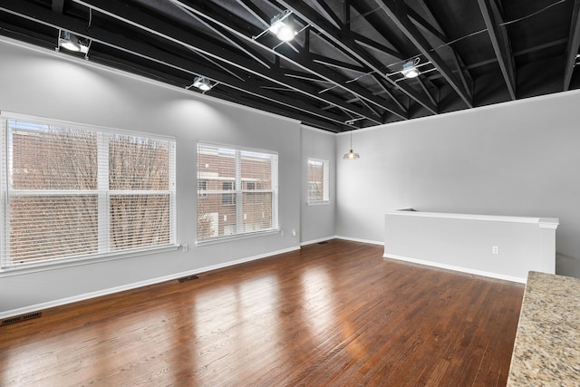 empty room featuring dark hardwood / wood-style floors