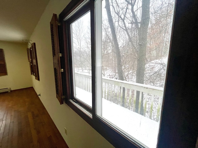 hallway featuring hardwood / wood-style flooring