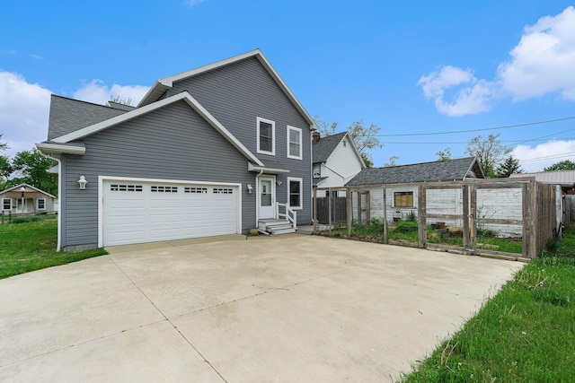 500 Myrtle Ave, Sturgis, MI 49091 - view of front of property featuring concrete driveway and fence