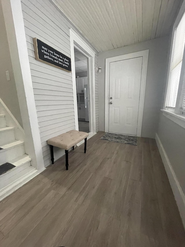 interior space with hardwood / wood-style floors and wood ceiling