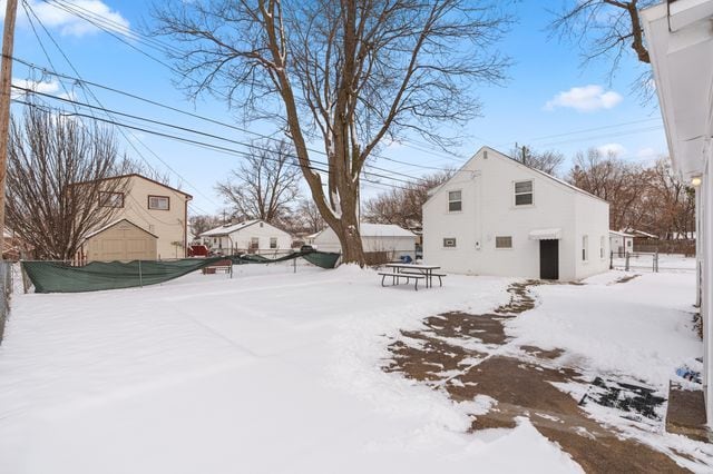 view of yard covered in snow