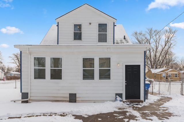 view of snow covered property