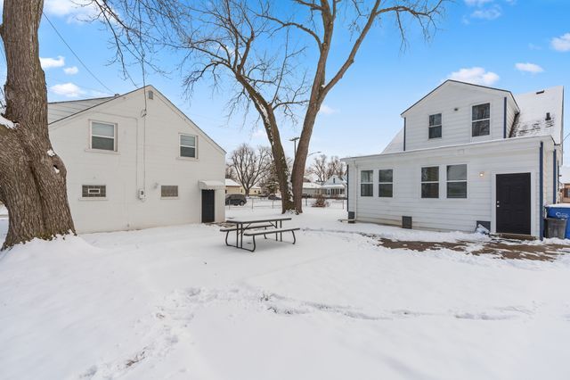 view of snow covered property