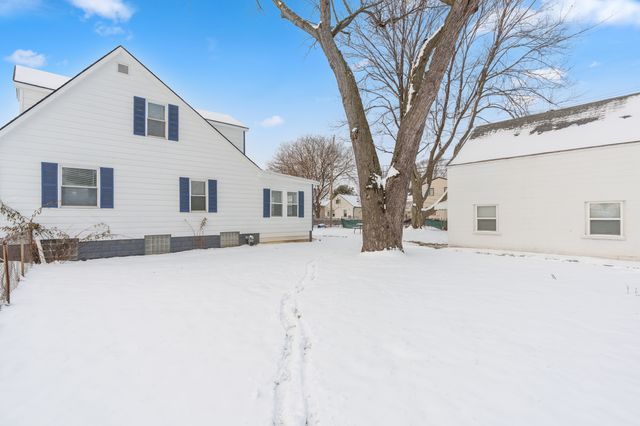 view of snow covered house