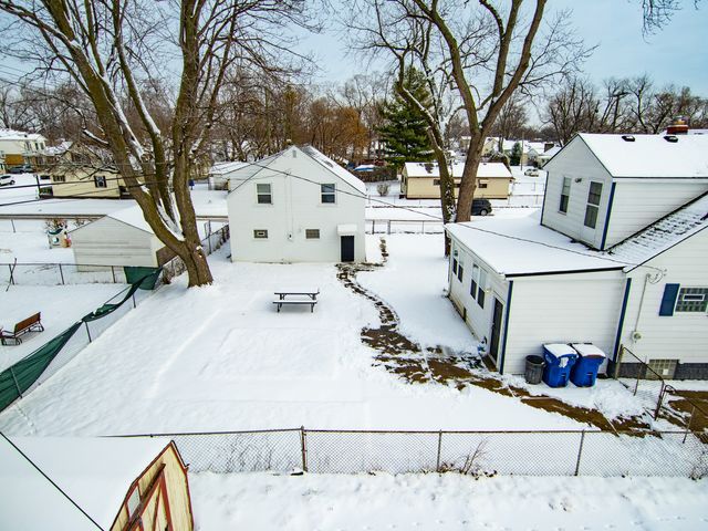 view of yard covered in snow