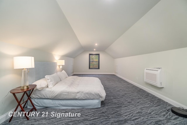 bedroom featuring dark carpet, lofted ceiling, and a wall mounted AC